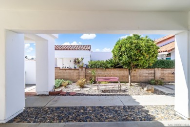 Perched atop a gentle slope, this single-story home offers a on Ocean Hills Country Club in California - for sale on GolfHomes.com, golf home, golf lot