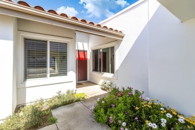 Perched atop a gentle slope, this single-story home offers a on Ocean Hills Country Club in California - for sale on GolfHomes.com, golf home, golf lot