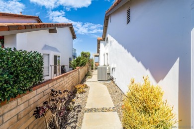 Perched atop a gentle slope, this single-story home offers a on Ocean Hills Country Club in California - for sale on GolfHomes.com, golf home, golf lot