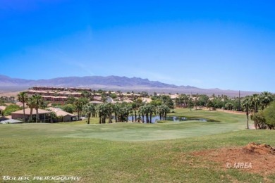 This gorgeous Summer Ridge townhome is tucked away at the end of on The Oasis Golf Club in Nevada - for sale on GolfHomes.com, golf home, golf lot