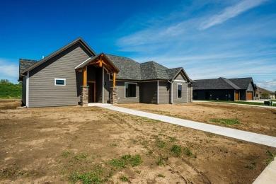 This beautifully crafted 3-bedroom, 2.5-bath home in the Powder on The Powder Horn Golf Club - Mountain in Wyoming - for sale on GolfHomes.com, golf home, golf lot