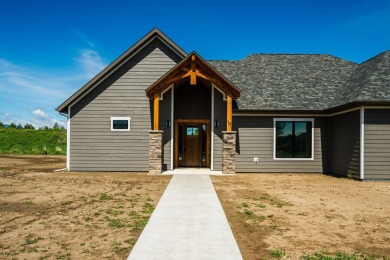 This beautifully crafted 3-bedroom, 2.5-bath home in the Powder on The Powder Horn Golf Club - Mountain in Wyoming - for sale on GolfHomes.com, golf home, golf lot