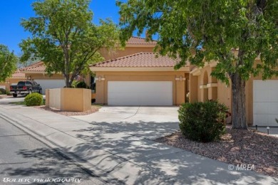 This gorgeous Summer Ridge townhome is tucked away at the end of on The Oasis Golf Club in Nevada - for sale on GolfHomes.com, golf home, golf lot