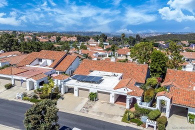 Perched atop a gentle slope, this single-story home offers a on Ocean Hills Country Club in California - for sale on GolfHomes.com, golf home, golf lot