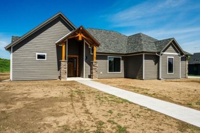 This beautifully crafted 3-bedroom, 2.5-bath home in the Powder on The Powder Horn Golf Club - Mountain in Wyoming - for sale on GolfHomes.com, golf home, golf lot