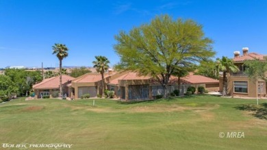 This gorgeous Summer Ridge townhome is tucked away at the end of on The Oasis Golf Club in Nevada - for sale on GolfHomes.com, golf home, golf lot