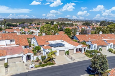 Perched atop a gentle slope, this single-story home offers a on Ocean Hills Country Club in California - for sale on GolfHomes.com, golf home, golf lot