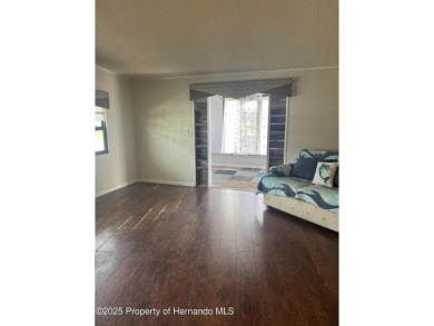 Calling all retired manatee and mermaid lovers, this on Brookridge Country Club in Florida - for sale on GolfHomes.com, golf home, golf lot