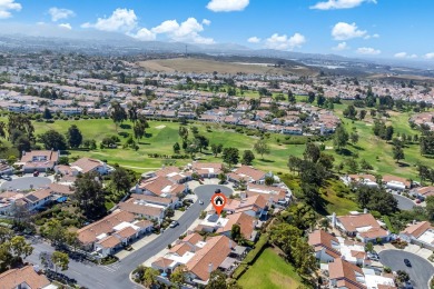 Perched atop a gentle slope, this single-story home offers a on Ocean Hills Country Club in California - for sale on GolfHomes.com, golf home, golf lot