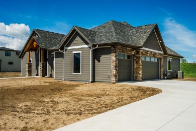 This beautifully crafted 3-bedroom, 2.5-bath home in the Powder on The Powder Horn Golf Club - Mountain in Wyoming - for sale on GolfHomes.com, golf home, golf lot