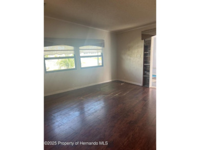 Calling all retired manatee and mermaid lovers, this on Brookridge Country Club in Florida - for sale on GolfHomes.com, golf home, golf lot