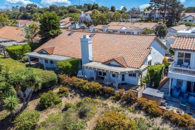 Perched atop a gentle slope, this single-story home offers a on Ocean Hills Country Club in California - for sale on GolfHomes.com, golf home, golf lot