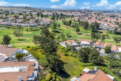 Perched atop a gentle slope, this single-story home offers a on Ocean Hills Country Club in California - for sale on GolfHomes.com, golf home, golf lot