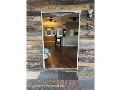 Calling all retired manatee and mermaid lovers, this on Brookridge Country Club in Florida - for sale on GolfHomes.com, golf home, golf lot