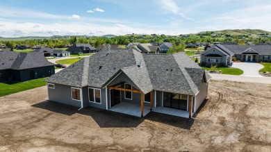 This beautifully crafted 3-bedroom, 2.5-bath home in the Powder on The Powder Horn Golf Club - Mountain in Wyoming - for sale on GolfHomes.com, golf home, golf lot