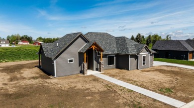 This beautifully crafted 3-bedroom, 2.5-bath home in the Powder on The Powder Horn Golf Club - Mountain in Wyoming - for sale on GolfHomes.com, golf home, golf lot