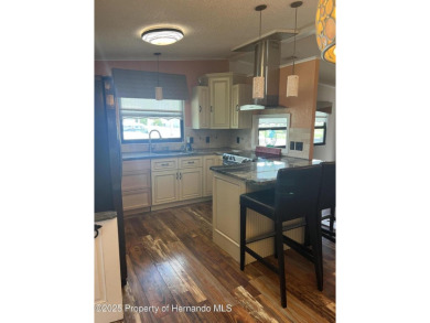 Calling all retired manatee and mermaid lovers, this on Brookridge Country Club in Florida - for sale on GolfHomes.com, golf home, golf lot