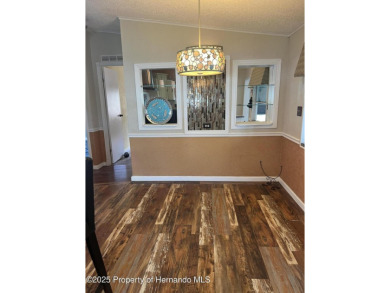 Calling all retired manatee and mermaid lovers, this on Brookridge Country Club in Florida - for sale on GolfHomes.com, golf home, golf lot