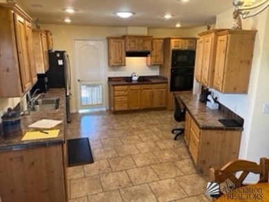 Well appointed with great location for desert  access and golf on Foothills Executive Golf Course in Arizona - for sale on GolfHomes.com, golf home, golf lot