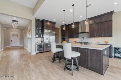 Experience luxury living on a premium lot with spectacular on Somersett Country Club in Nevada - for sale on GolfHomes.com, golf home, golf lot