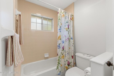 Enjoy a peaceful backyard with mature trees surrounding this on Country Club of Orange Park in Florida - for sale on GolfHomes.com, golf home, golf lot