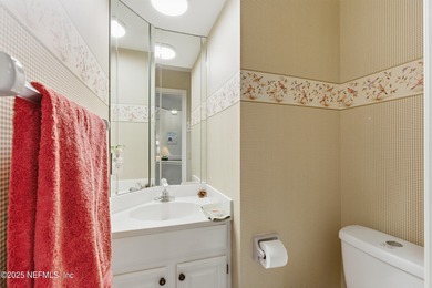 Enjoy a peaceful backyard with mature trees surrounding this on Country Club of Orange Park in Florida - for sale on GolfHomes.com, golf home, golf lot