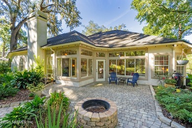 Enjoy a peaceful backyard with mature trees surrounding this on Country Club of Orange Park in Florida - for sale on GolfHomes.com, golf home, golf lot