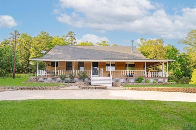 EAST TEXAS DREAM - Fabulous log home with wraparound porches on Southern Hills Golf Club in Texas - for sale on GolfHomes.com, golf home, golf lot