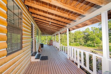 EAST TEXAS DREAM - Fabulous log home with wraparound porches on Southern Hills Golf Club in Texas - for sale on GolfHomes.com, golf home, golf lot