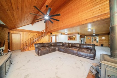 EAST TEXAS DREAM - Fabulous log home with wraparound porches on Southern Hills Golf Club in Texas - for sale on GolfHomes.com, golf home, golf lot