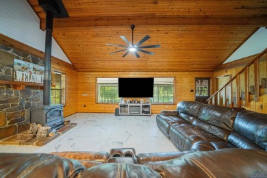 EAST TEXAS DREAM - Fabulous log home with wraparound porches on Southern Hills Golf Club in Texas - for sale on GolfHomes.com, golf home, golf lot