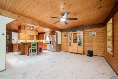 EAST TEXAS DREAM - Fabulous log home with wraparound porches on Southern Hills Golf Club in Texas - for sale on GolfHomes.com, golf home, golf lot