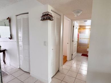 GREAT OPPORTUNITY IN PALM SPRINGS! 2 BEDROOMS, 2 BATHROOMS, WITH on Oriole Golf and Tennis Club in Florida - for sale on GolfHomes.com, golf home, golf lot