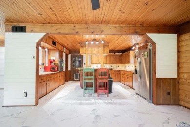 EAST TEXAS DREAM - Fabulous log home with wraparound porches on Southern Hills Golf Club in Texas - for sale on GolfHomes.com, golf home, golf lot