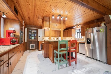 EAST TEXAS DREAM - Fabulous log home with wraparound porches on Southern Hills Golf Club in Texas - for sale on GolfHomes.com, golf home, golf lot