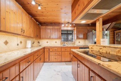 EAST TEXAS DREAM - Fabulous log home with wraparound porches on Southern Hills Golf Club in Texas - for sale on GolfHomes.com, golf home, golf lot