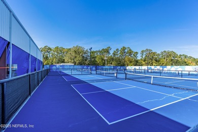Enjoy a peaceful backyard with mature trees surrounding this on Country Club of Orange Park in Florida - for sale on GolfHomes.com, golf home, golf lot