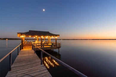 This exceptional, fully remodeled luxury lake home is a true on De Cordova Bend Country Club in Texas - for sale on GolfHomes.com, golf home, golf lot