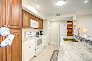 Escape the cold and live in paradise! Just a short walk to the on Ocean Club At the Hutchinson Island Beach Resort in Florida - for sale on GolfHomes.com, golf home, golf lot