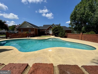 Beautiful Brick Home with circle Driveway. Step Inside to a on Dublin Country Club in Georgia - for sale on GolfHomes.com, golf home, golf lot