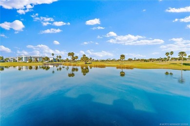 Enjoy sunny, wide views of the lake & golf course from the on Ocean Club At the Hutchinson Island Beach Resort in Florida - for sale on GolfHomes.com, golf home, golf lot