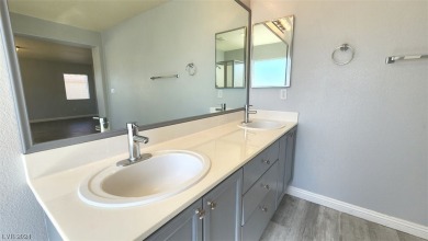 Recently remodeled 4 bedroom 3 bathroom home waiting for you! on Rhodes Ranch Golf Club in Nevada - for sale on GolfHomes.com, golf home, golf lot