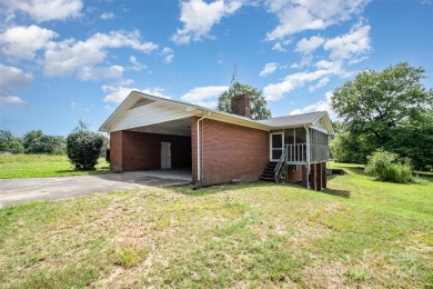 Over 9 acres of beautiful pasture with gentle rolling hills on Woodbridge Golf Links in North Carolina - for sale on GolfHomes.com, golf home, golf lot