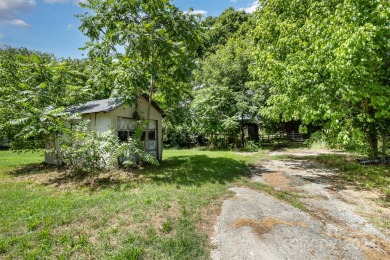 Over 9 acres of beautiful pasture with gentle rolling hills on Woodbridge Golf Links in North Carolina - for sale on GolfHomes.com, golf home, golf lot