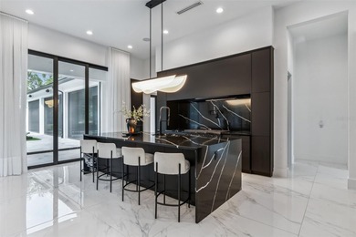 Set within the exclusive guard gated community of Bella Collina on Bella Collina Golf Club in Florida - for sale on GolfHomes.com, golf home, golf lot