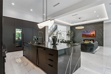 Set within the exclusive guard gated community of Bella Collina on Bella Collina Golf Club in Florida - for sale on GolfHomes.com, golf home, golf lot