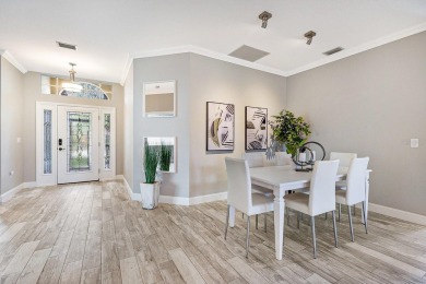 Step inside this classy 3 bedroom 2 bath home with views of the on Stoneybrook Golf Club At Heritage Harbour in Florida - for sale on GolfHomes.com, golf home, golf lot