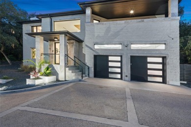 Bold, sophisticated, and move-in ready -- this natural modern on Austin Country Club in Texas - for sale on GolfHomes.com, golf home, golf lot