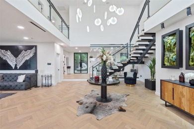 Bold, sophisticated, and move-in ready -- this natural modern on Austin Country Club in Texas - for sale on GolfHomes.com, golf home, golf lot