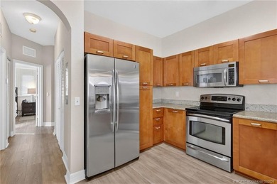 Discover this spacious corner home with two bedrooms, two full on Monterey Yacht and Country Club in Florida - for sale on GolfHomes.com, golf home, golf lot